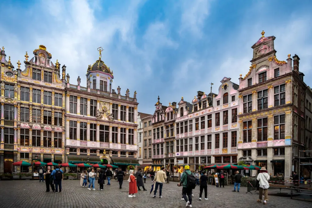Tourists visiting vibrant plaza in Brussels, Belgium