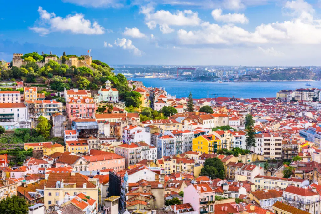 Lisbon, Portugal City Skyline with Sao Jorge Castle and the Tagus River