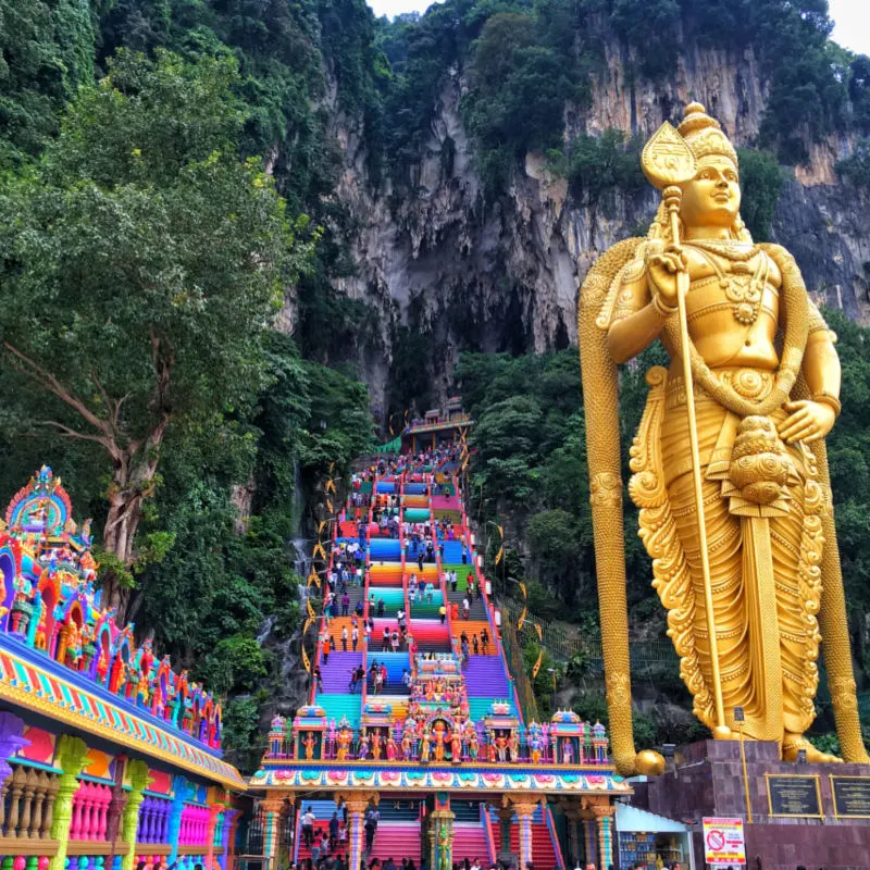 colorful stairs and statue at batu caves Malaysia
