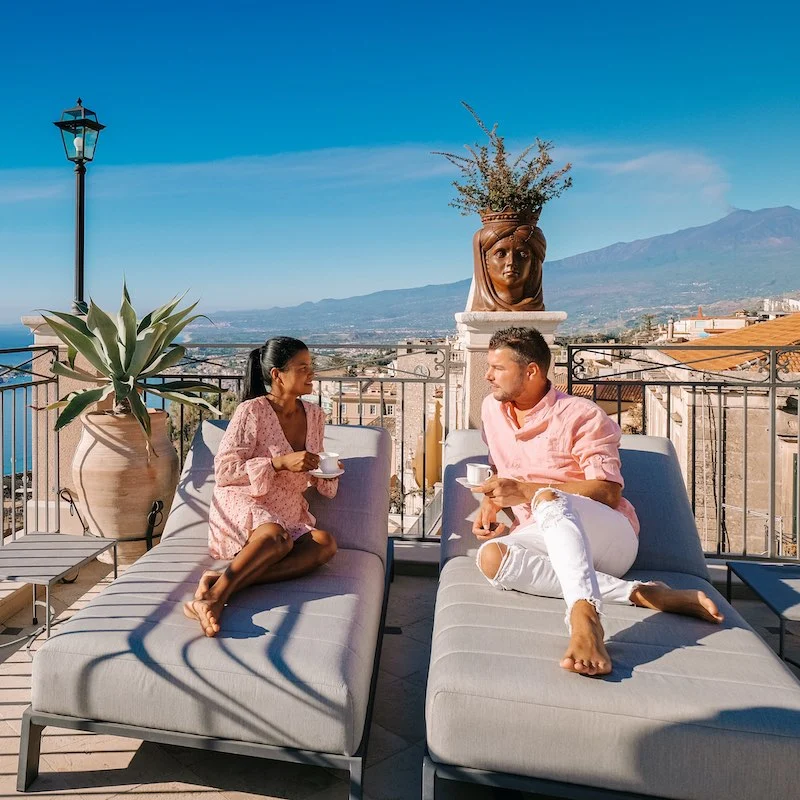 Couple enjoying resort in Taormina, Italy