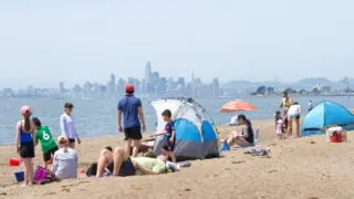 People on beach in Alameda, California