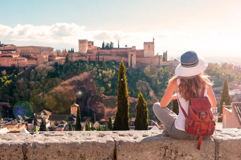 Woman overlooking Granada, Spain