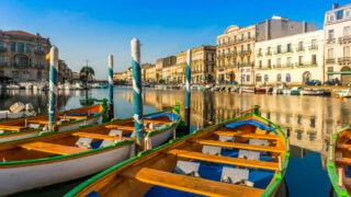 Boats lining canal in Sete, France