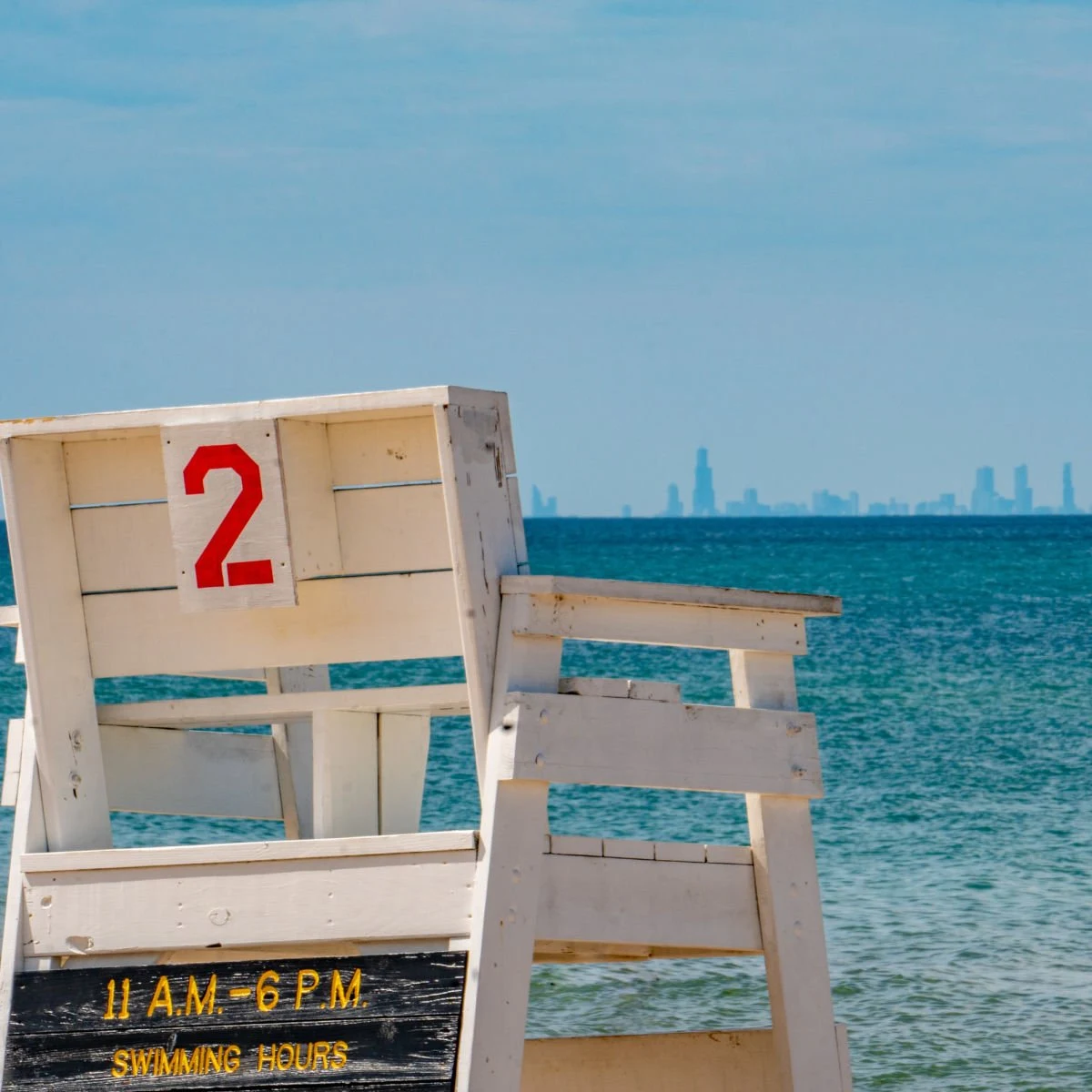 Lifeguard chair facing Chicago skyline