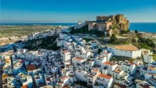 Majestic Castles & Unspoiled Shores_ Discover Spain's Secret Beach Town This Summer