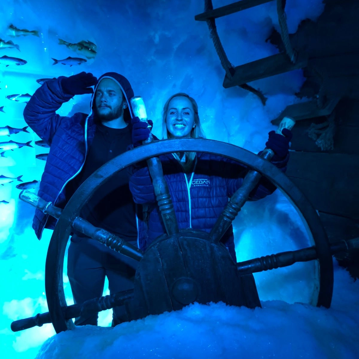 Man and woman at Amsterdam Ice Bar. Tyler and Liz Fox