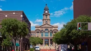 Historic building and red brick roads in Fort Worth