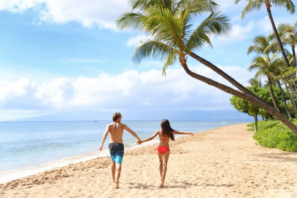 Couple on Kaaanapali beach, Maui, USA.