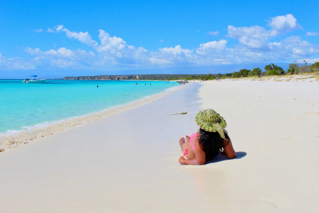 Woman relaxing in Bahia de las Aguilas near Cabo Rojo, Dominican Republic
