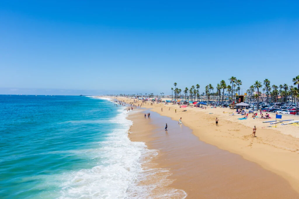 Beachgoers enjoying beautiful day in Newport Beach