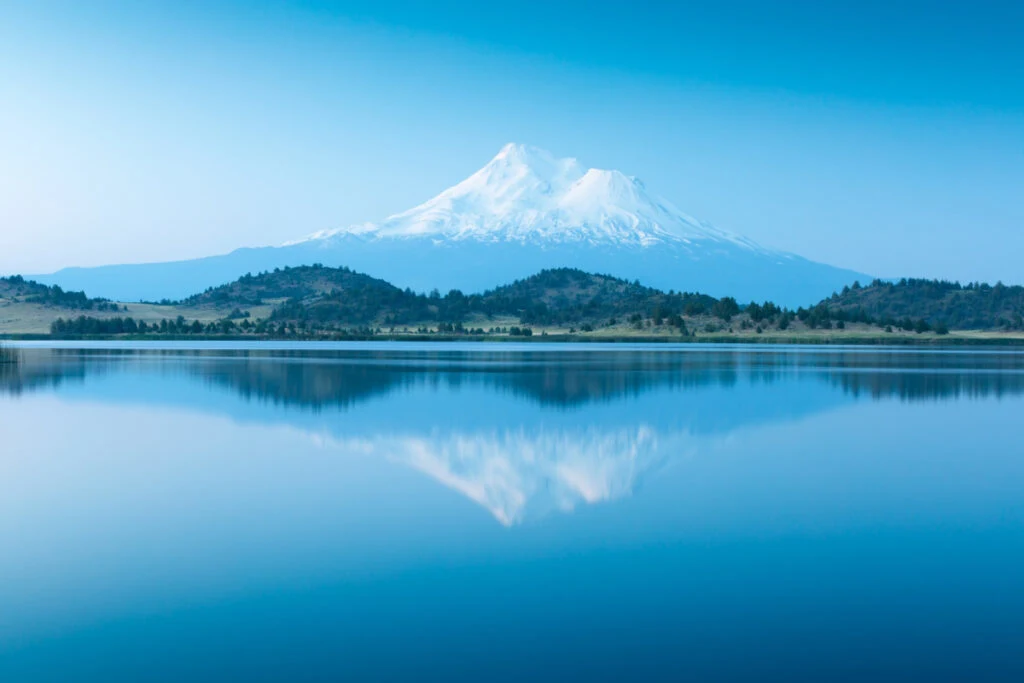 Snow-capped mountain reflection on Lake Siskiyou