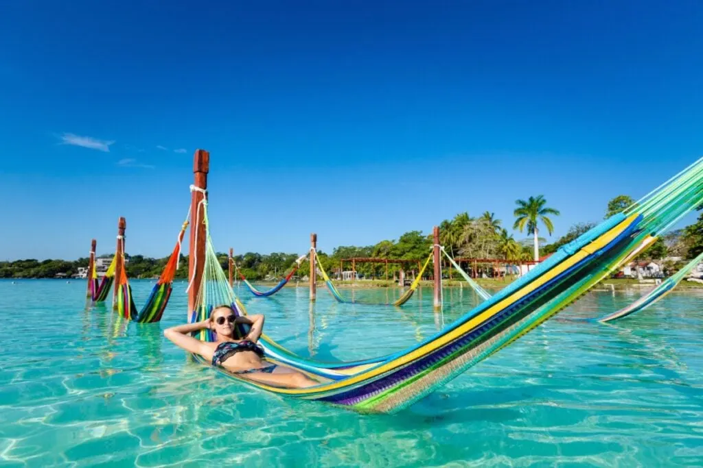 Woman relaxing on the lagoon in Bacalar