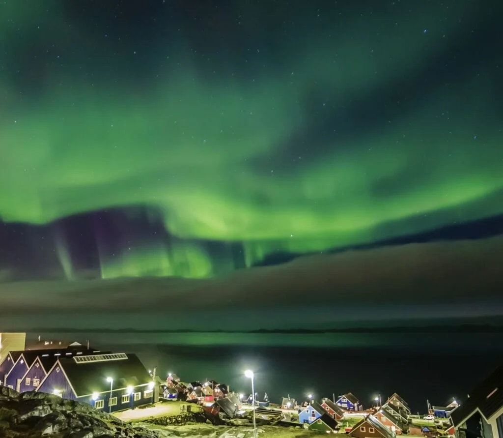 northern lights hidden over Nuuk city