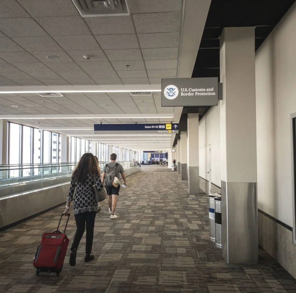 Passenger heads towards customs and border patrol usa