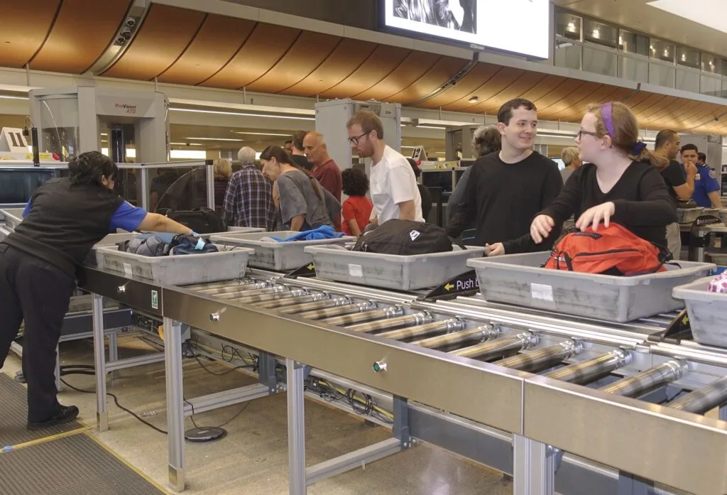 Passengers in line going through TSA Checkpoint