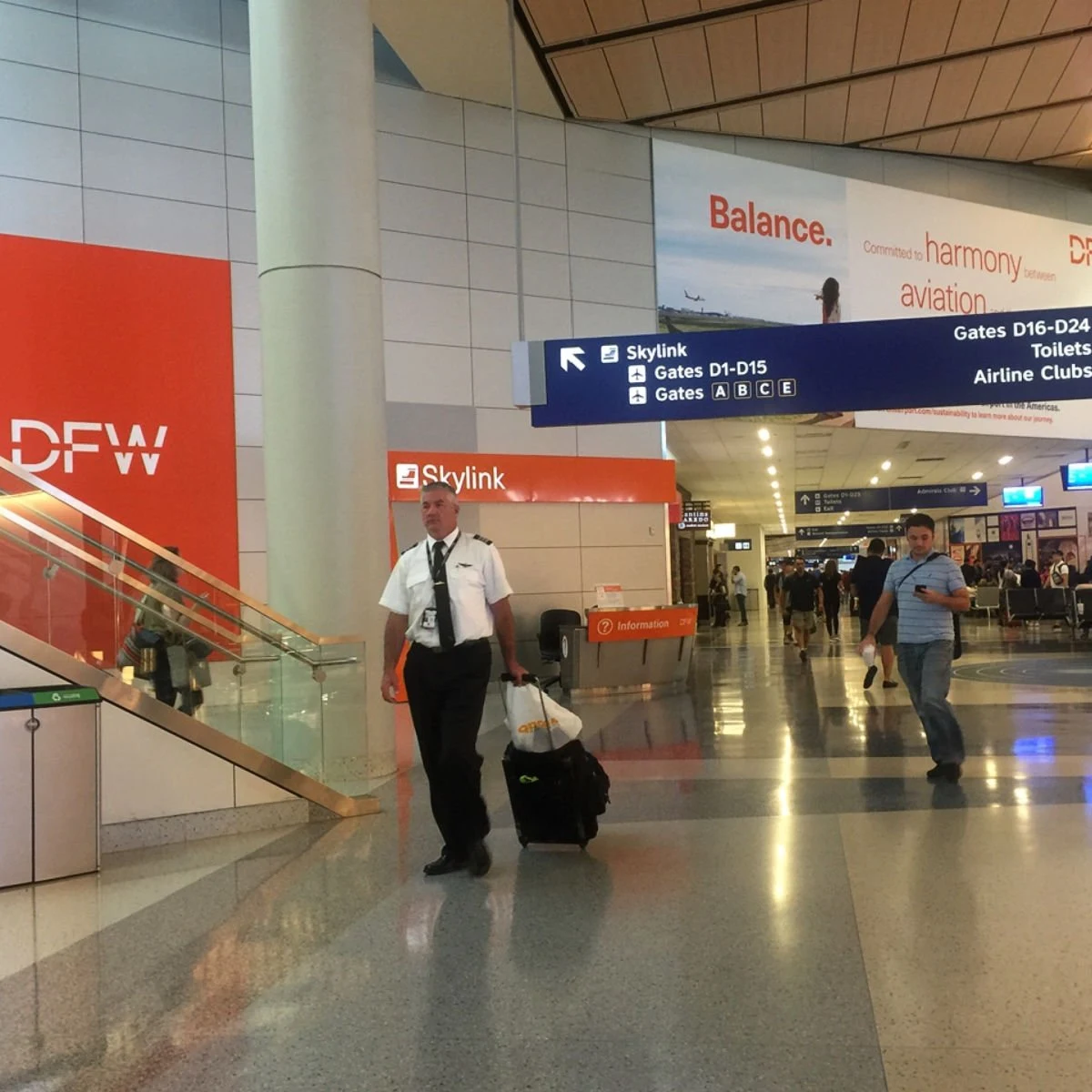 Pilot walking in DFW airport in Dallas