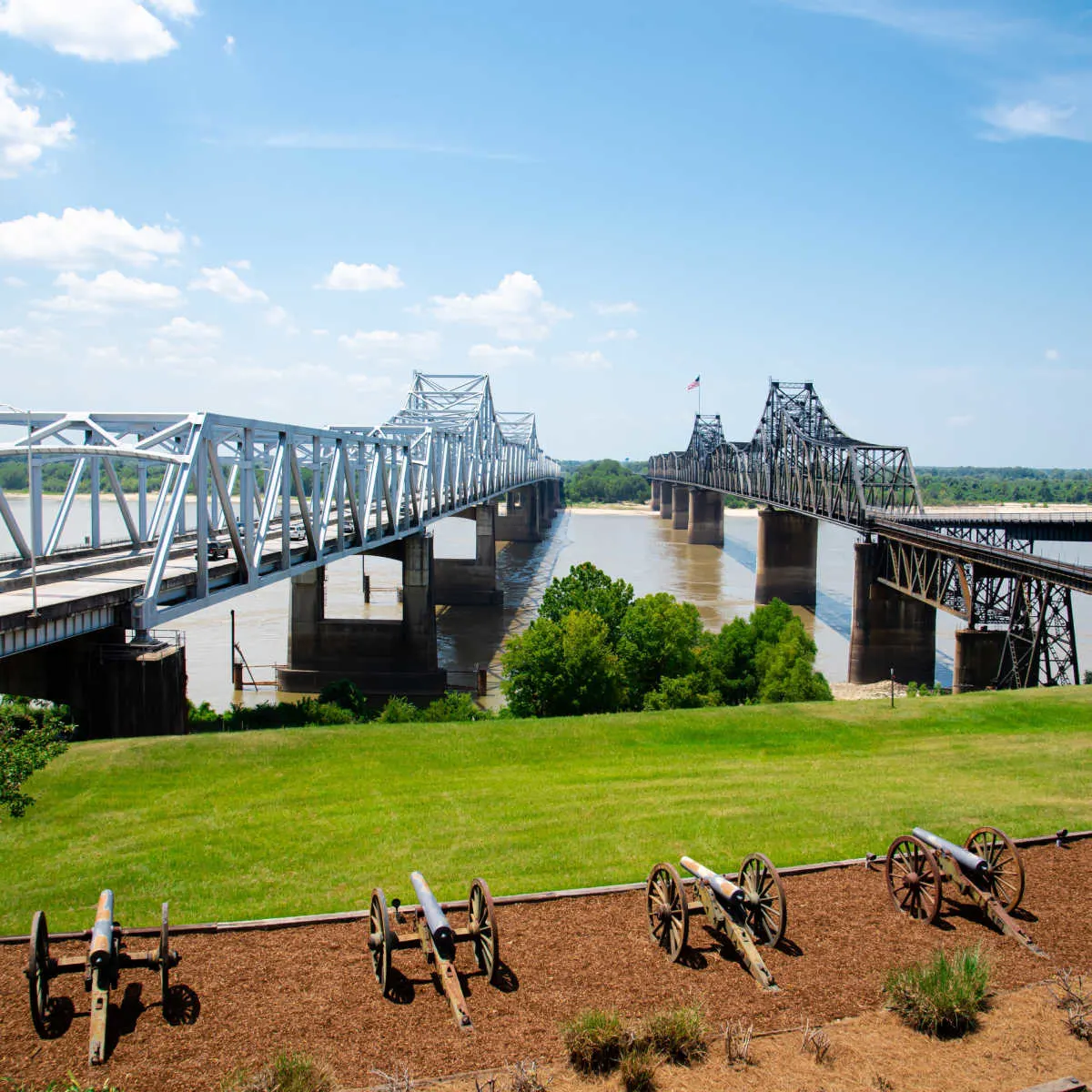 Row of canons display at historic Vicksburg battlefield along Mississippi River