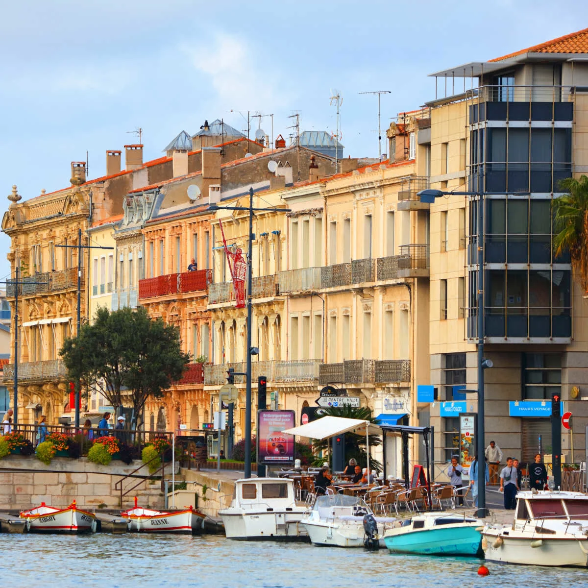 Row of historic buildings lining canal in Sete, France