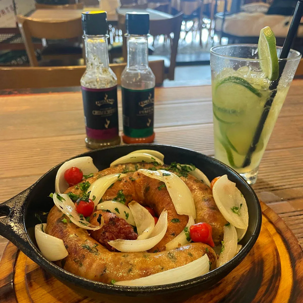 Sausage dish and caipirinha in Belo Horizonte, Brazil