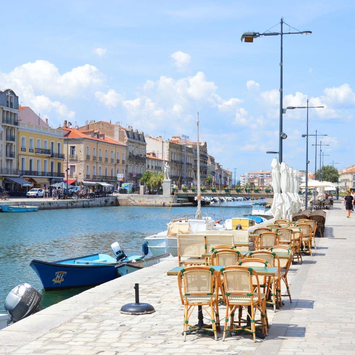 Sidewalk seating along canal in Sete, France