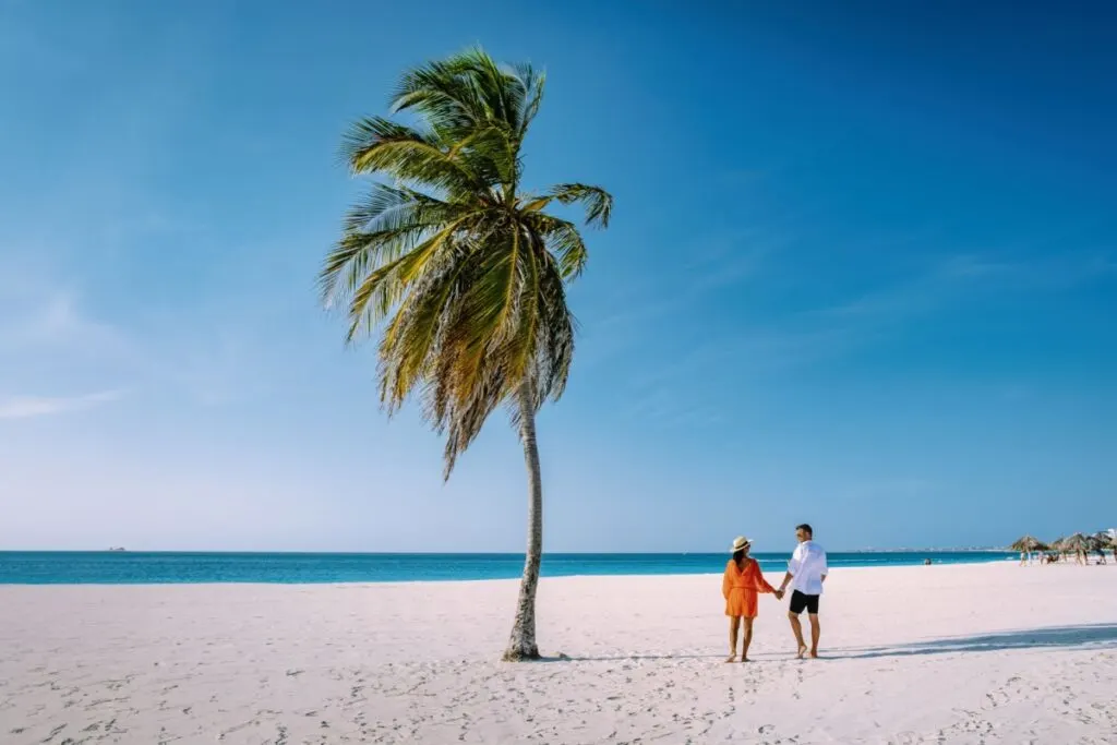 Couple on Eagle Beach in Aruba.