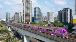 Purple train in Taiwan zooming through city