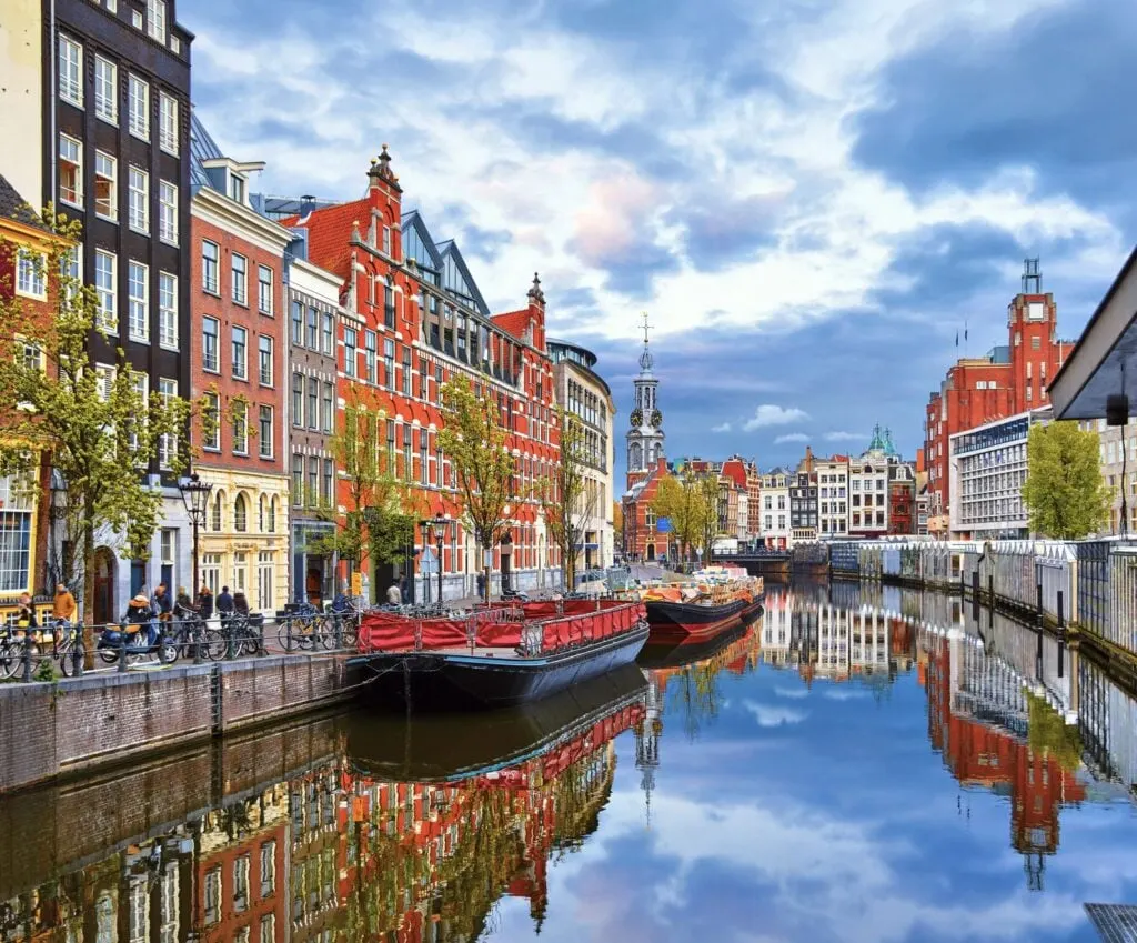 The canal in Amsterdam Netherlands houses the Amstel River, which is the landmark of the ancient European city.