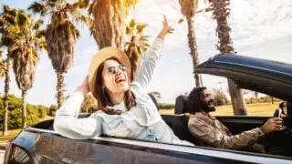 Woman in a convertible in California