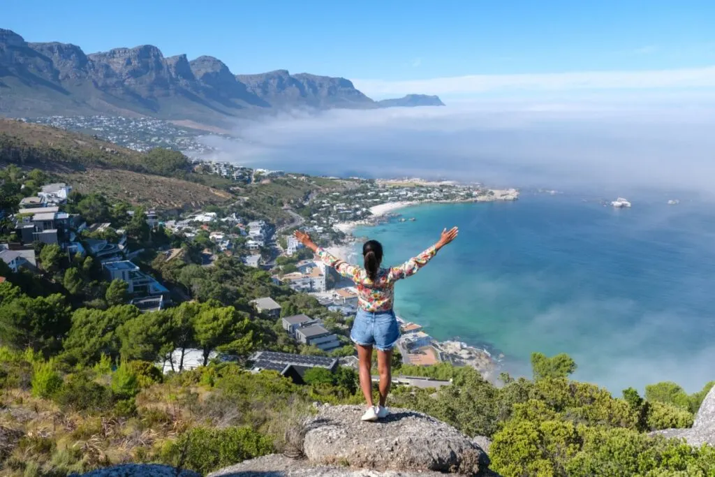 Woman at the rock viewpoint over Cape Town