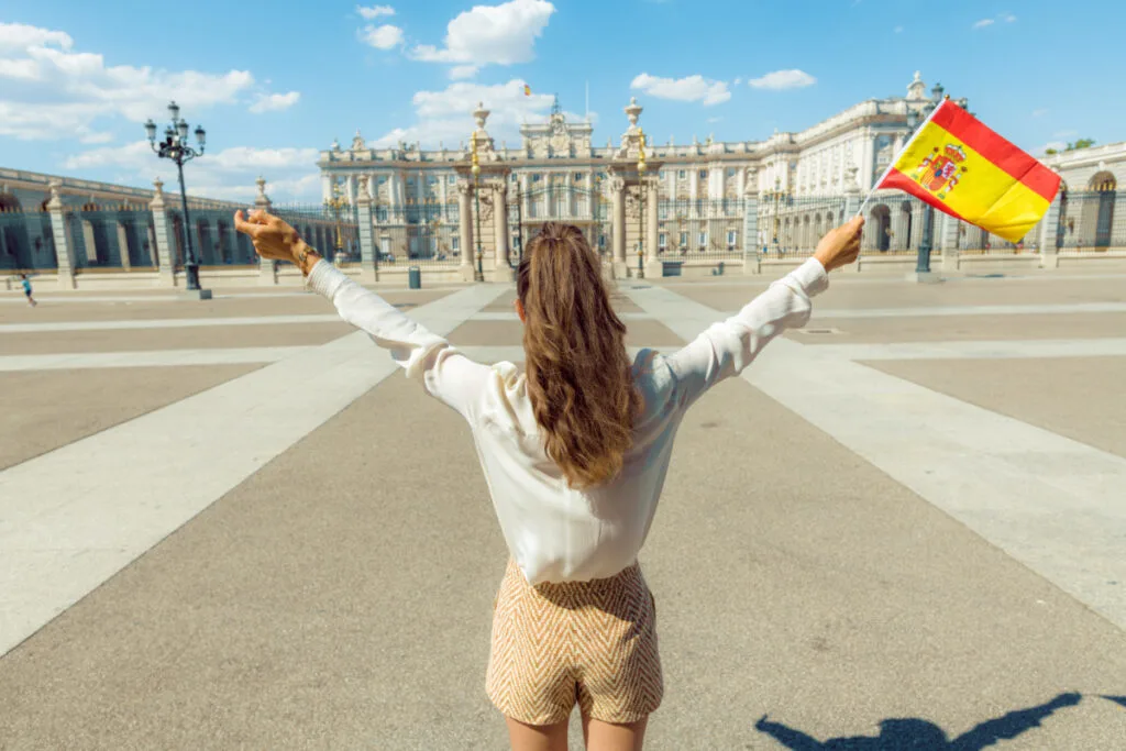 Woman in Madrid with Flag