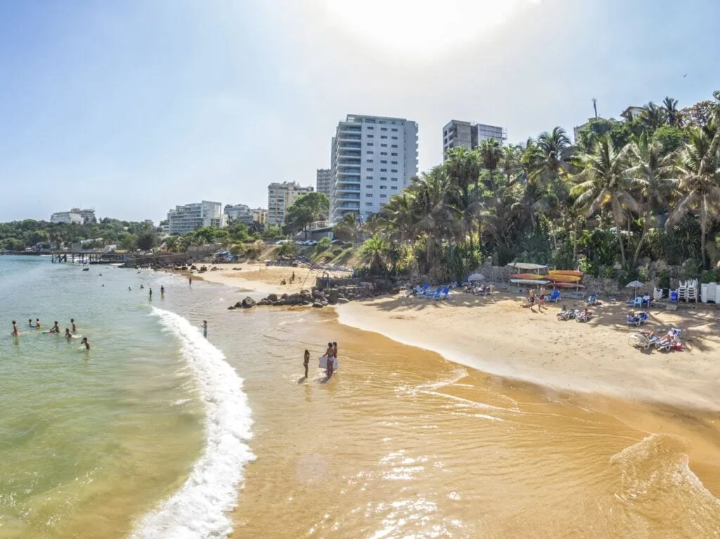 Tourists and the local residents of Dakar spend their holidays on the beautiful beaches