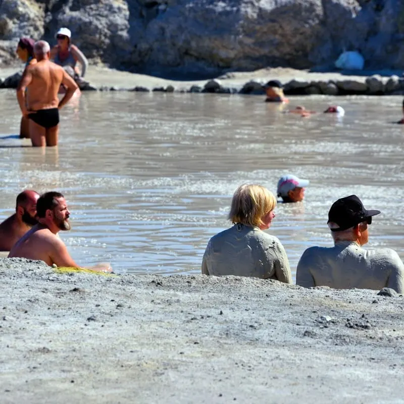 Tourists Bathing In A Mud Pool In Vulcano Islands, Aeolian Islands, Off The Coast Of Sicily, Italy, Southern Europe