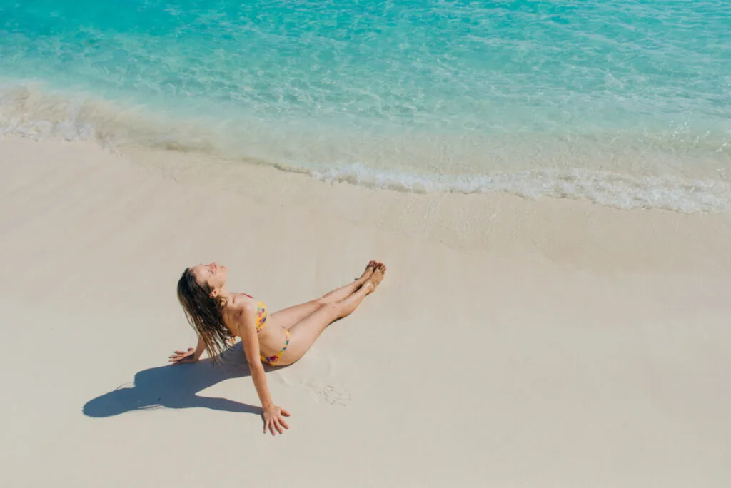 Woman on the beach in the Caribbean