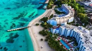 Why Americans Are Flocking To This Caribbean Island Despite Safety Warnings