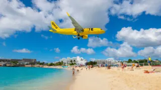 Spirit plane flying over St. Maarten