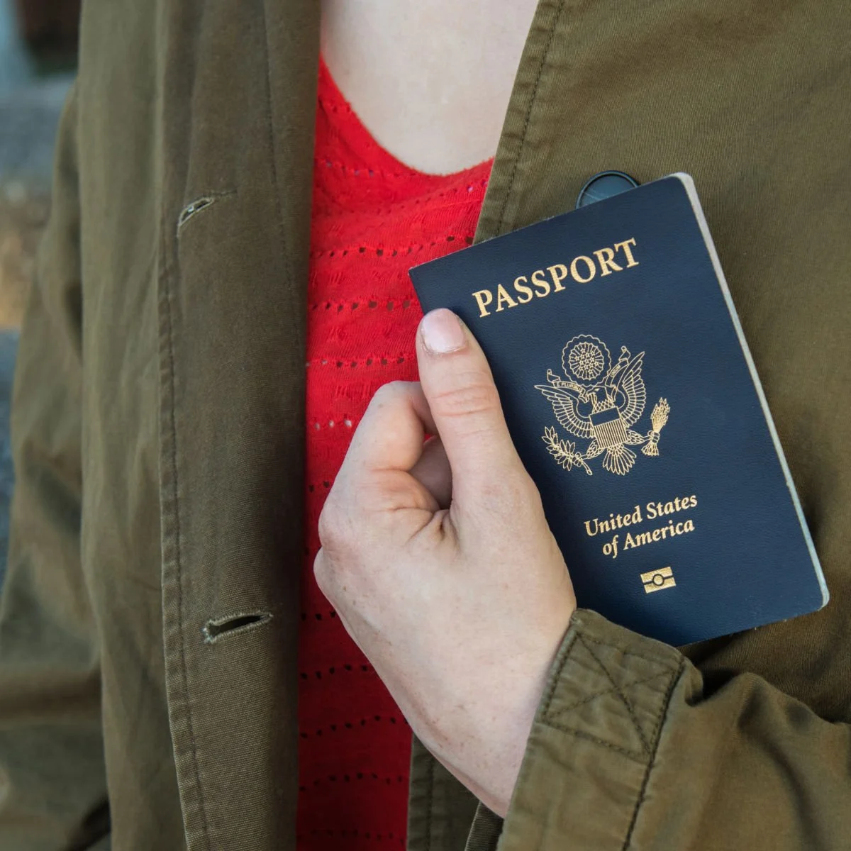 Woman clutching American passport