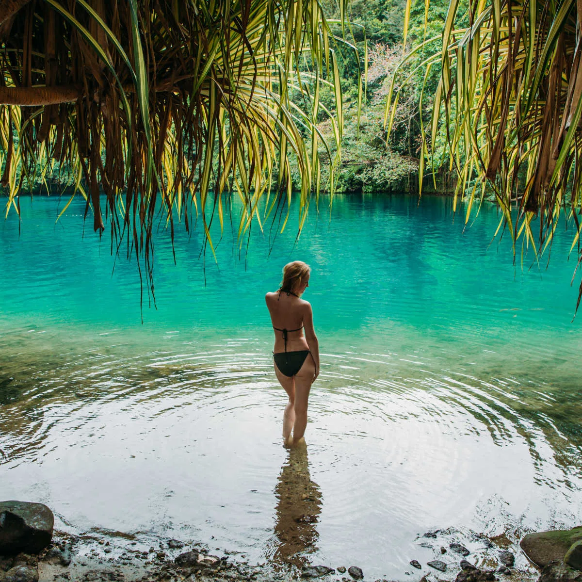 Woman visiting Blue Lagoon - Port Antonio, Jamaica