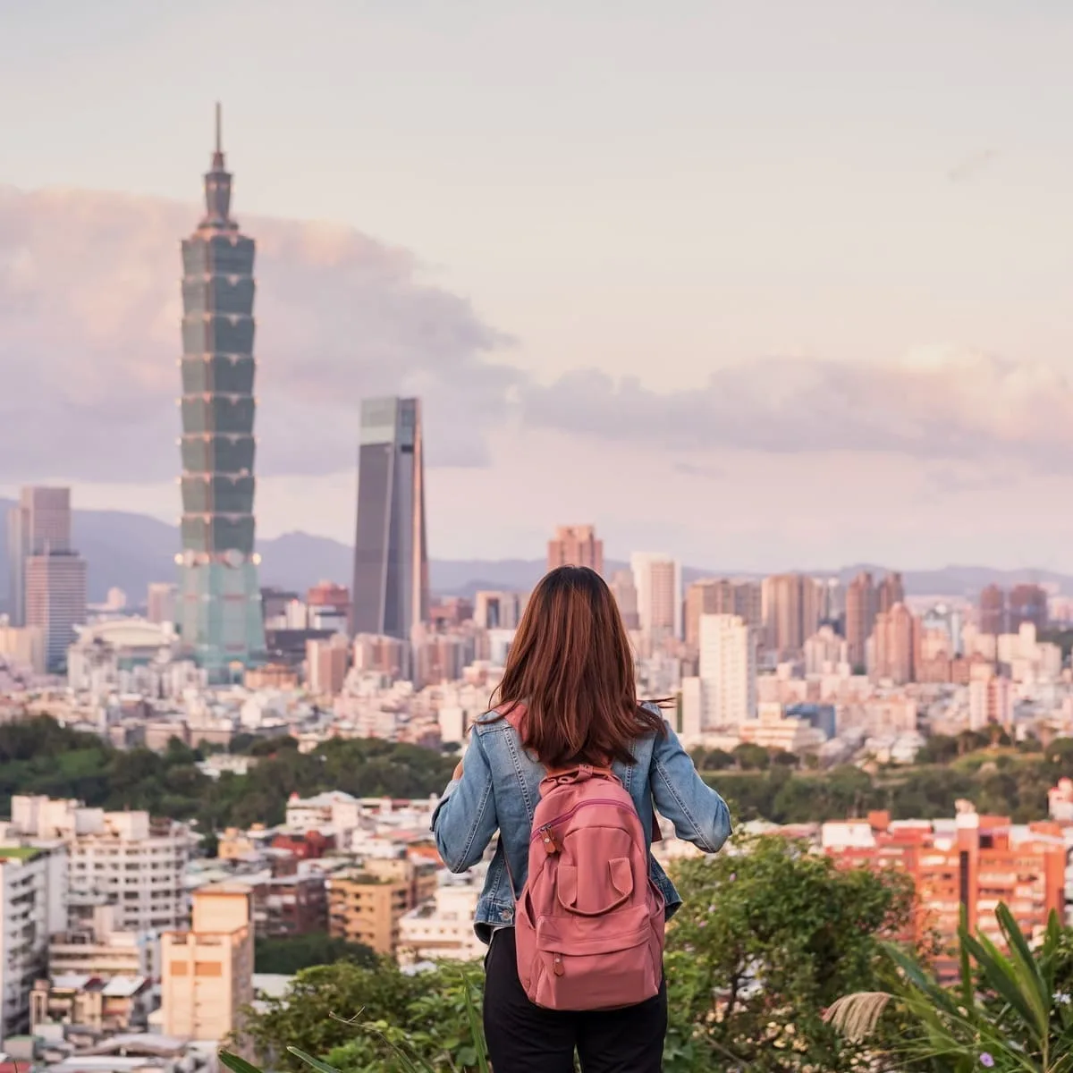 Young woman admiring view of Taipei